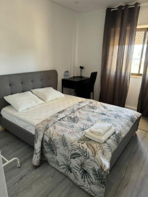 Spacious Bedroom In a Modern T3 Apartment